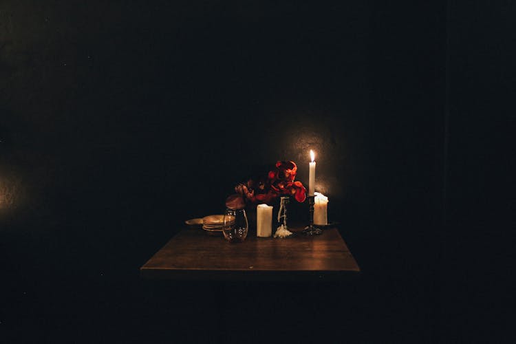 A Candle On A Table