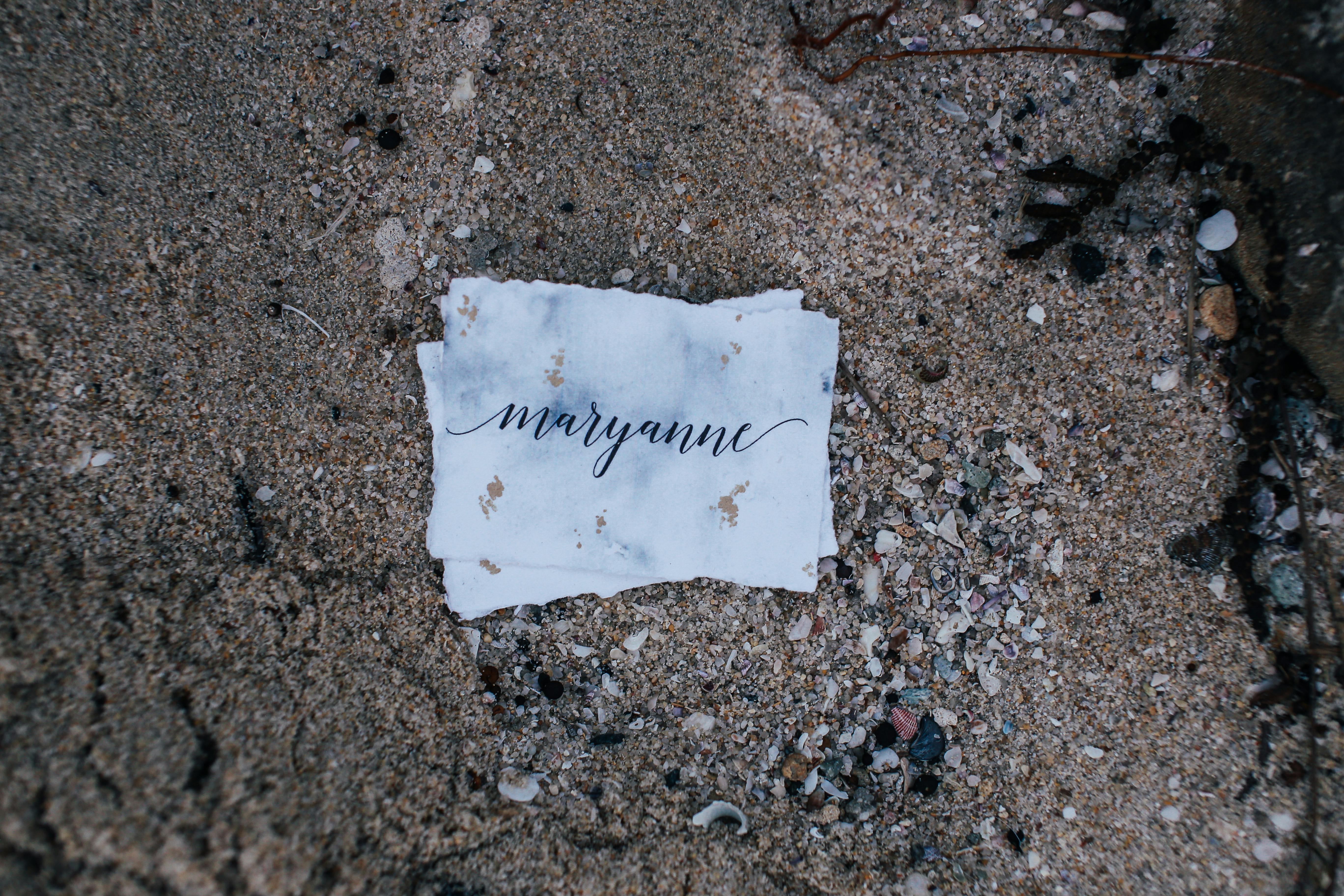 close up of name tag on rock