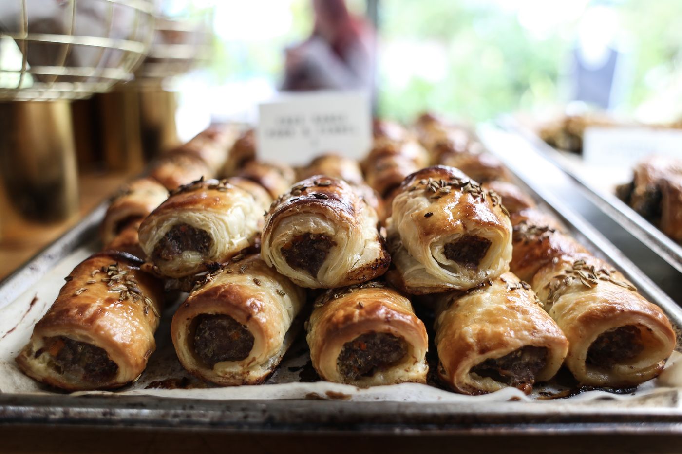 Golden homemade sausage rolls with flaky pastry