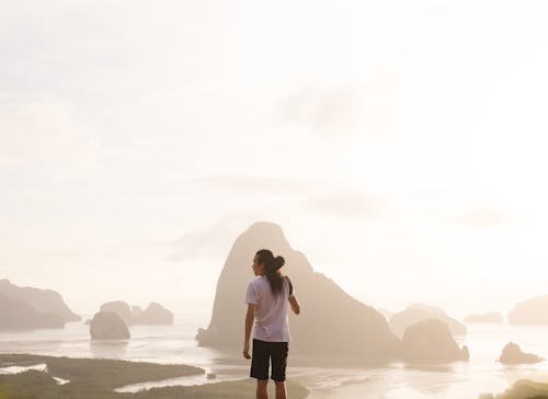 Man Standing on a Beach 