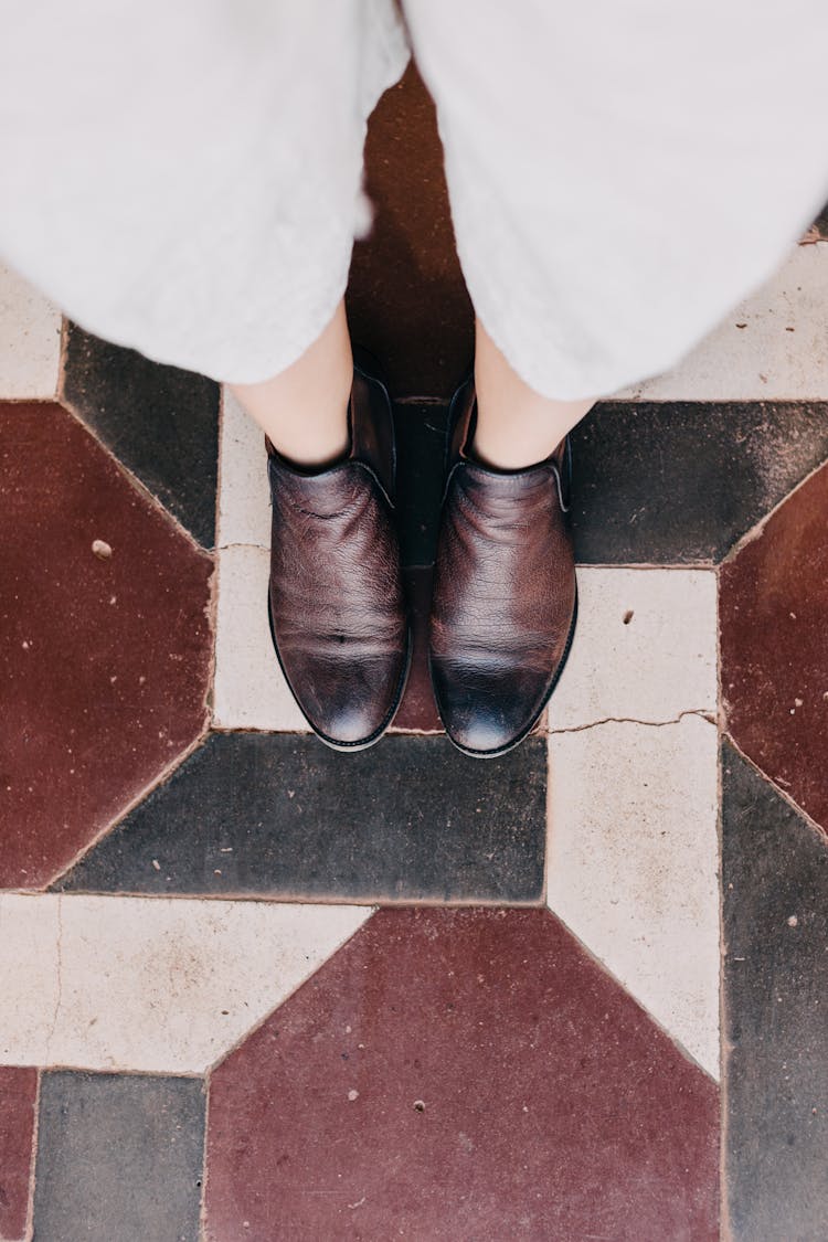 Person Wearing Leather Shoes