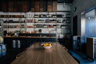 A Bowl of Lemons on Top of a Wooden Table