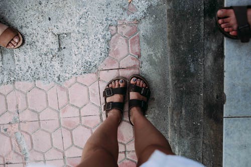 Free Feet Wearing Black Sandals Stock Photo