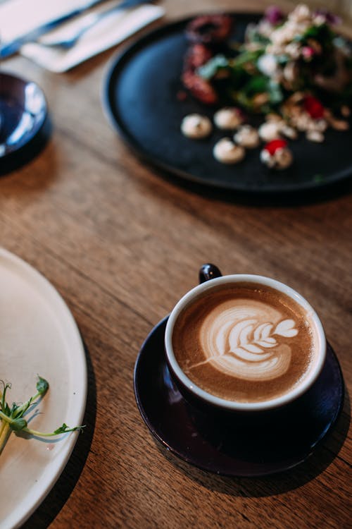Free Blue Ceramic Cup With Latte Art Stock Photo