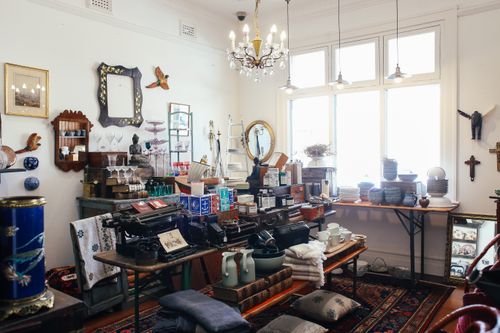 Free A well-lit antique shop filled with vintage items, decor, and collectibles on display. Stock Photo