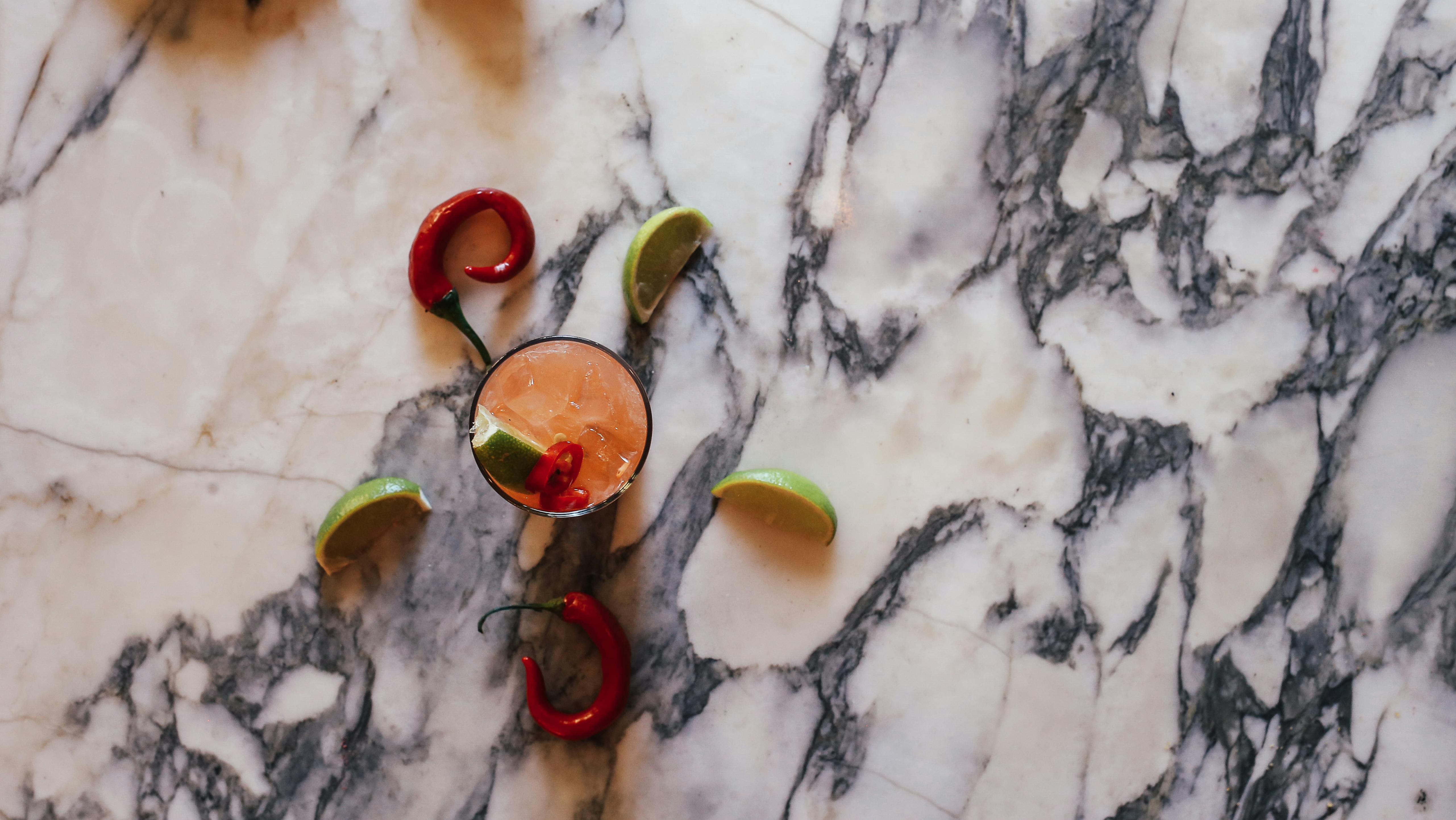Free Fresh Cold Cocktail on a Marble Counter Stock Photo