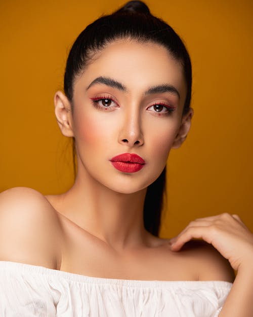 A Woman in White Off Shoulder Top