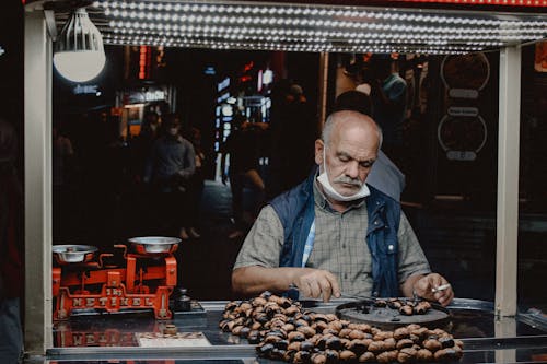 A Man Cooking on the Street