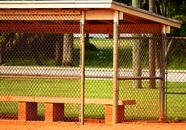 Grey Metal Fence Near Green Grass Field