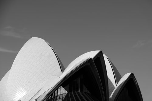 Free Artistic black and white capture of the iconic Sydney Opera House architecture in a minimalist style. Stock Photo