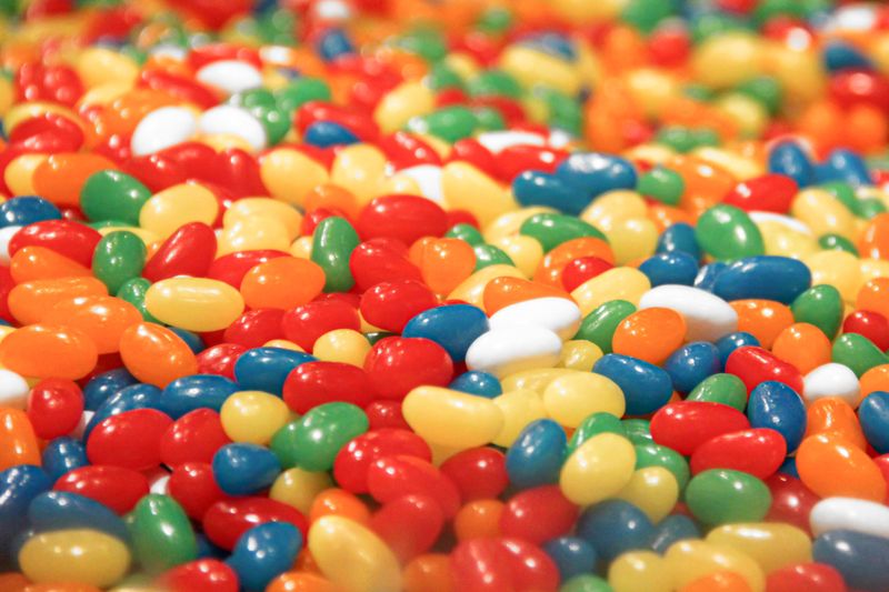 A close up shot of colorful jelly beans in a bowl