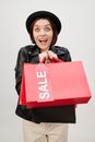 A Happy Woman Holding Shopping Paper Bags