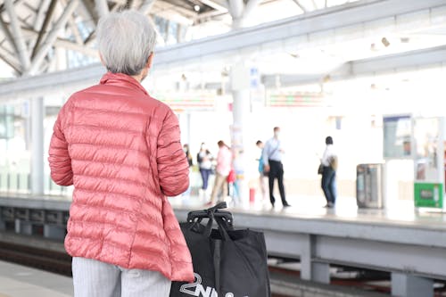 Woman Waiting on Train Station