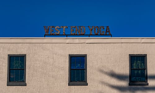 West End Yoga Sign on a Building