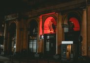 Red and White Building during Nighttime