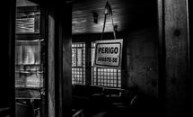 Grayscale Photo of a Room With a Window