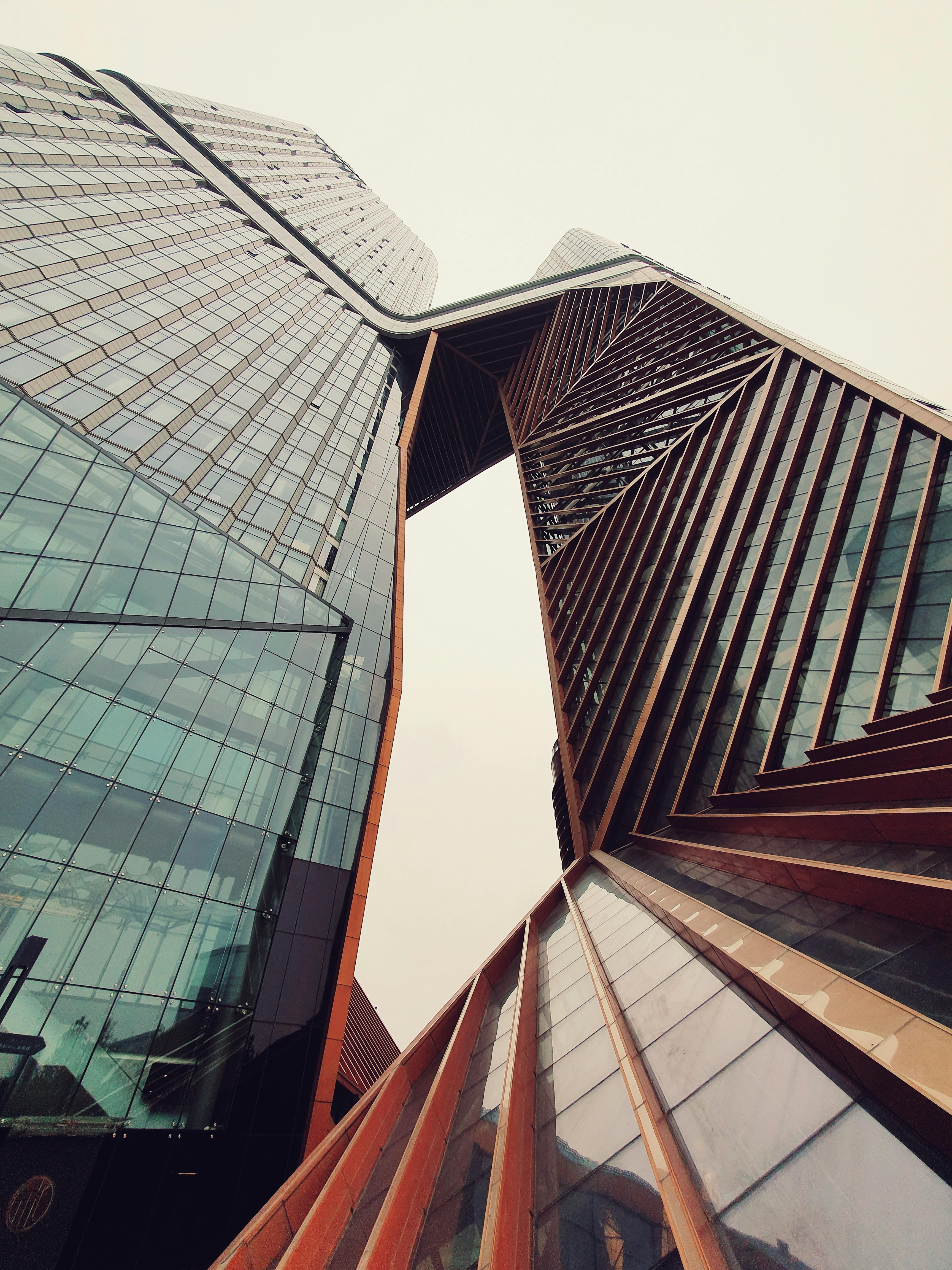 Close-up of a laptop motherboard being repaired with precision tools