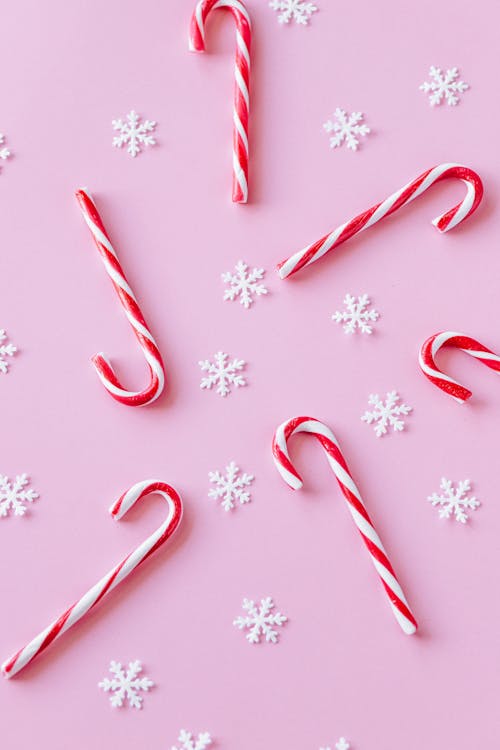 Free White and Red Candy Canes with Snowflakes  Stock Photo