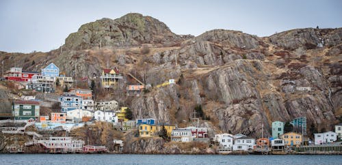 Assorted-color Buildings Near Body of Water