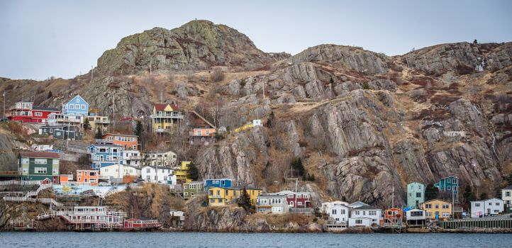 Assorted-color Buildings Near Body of Water
