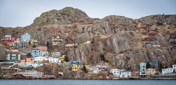 Assorted-color Buildings Near Body Of Water