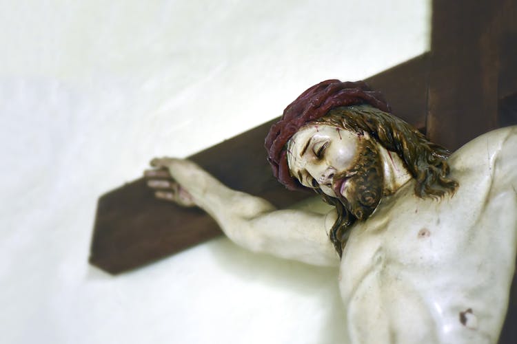 Close-up Of A Jesus On The Cross Figurine