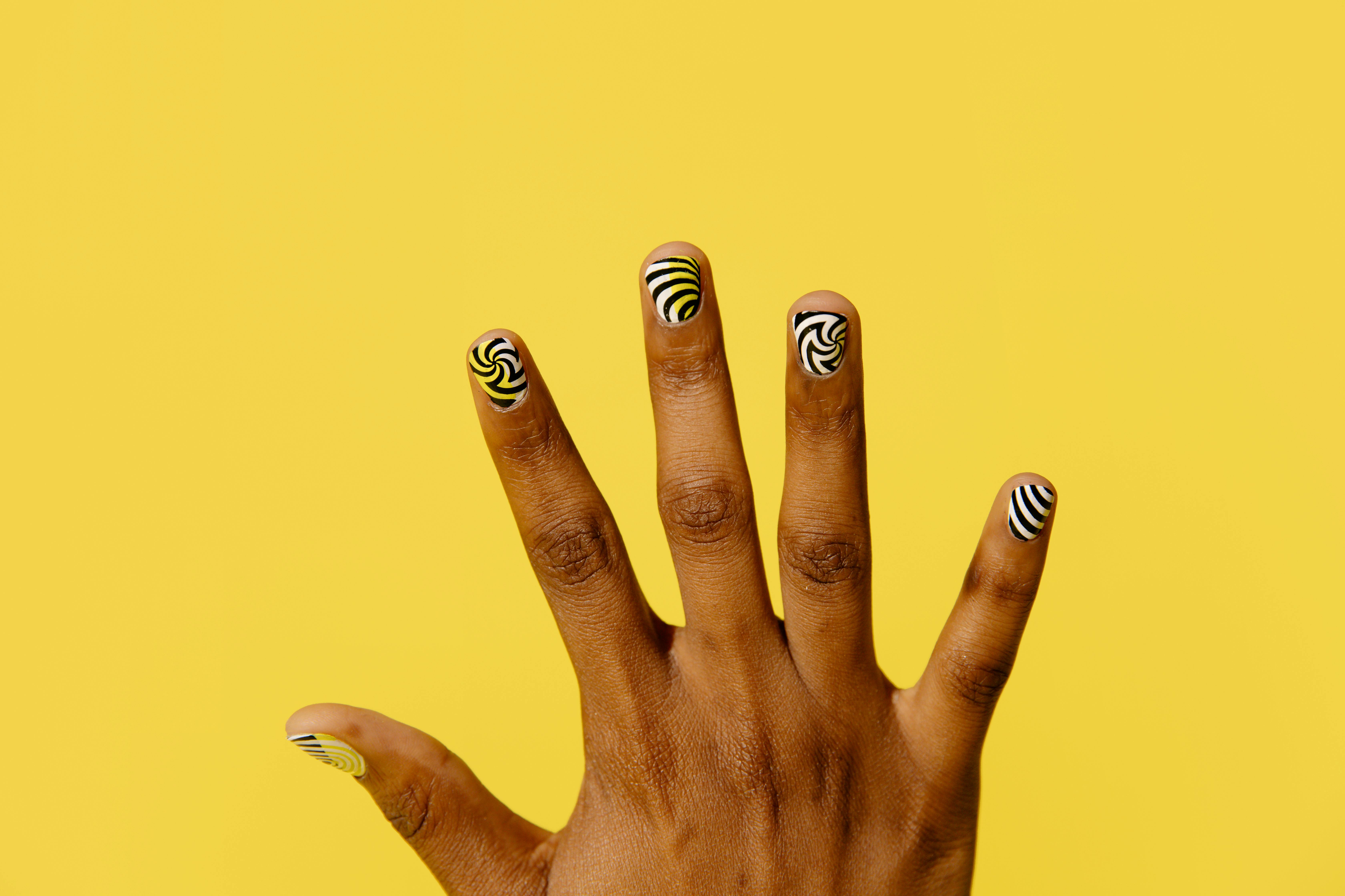 Fingers with nail polish · free stock photo