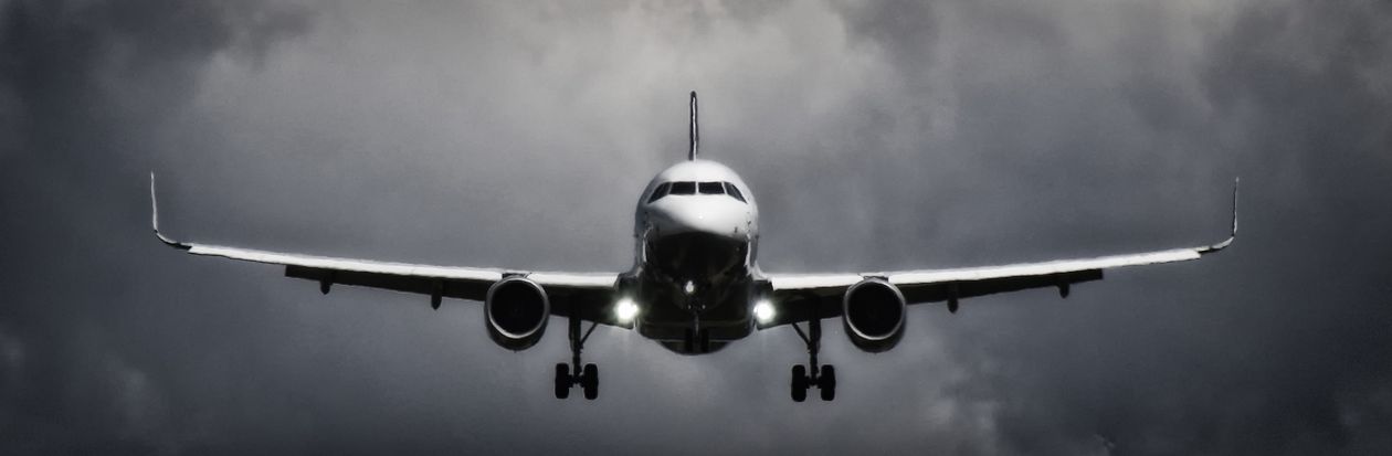 Airliner flying into storm clouds