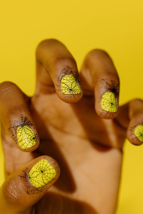 Close Up Photo of Manicured Nails