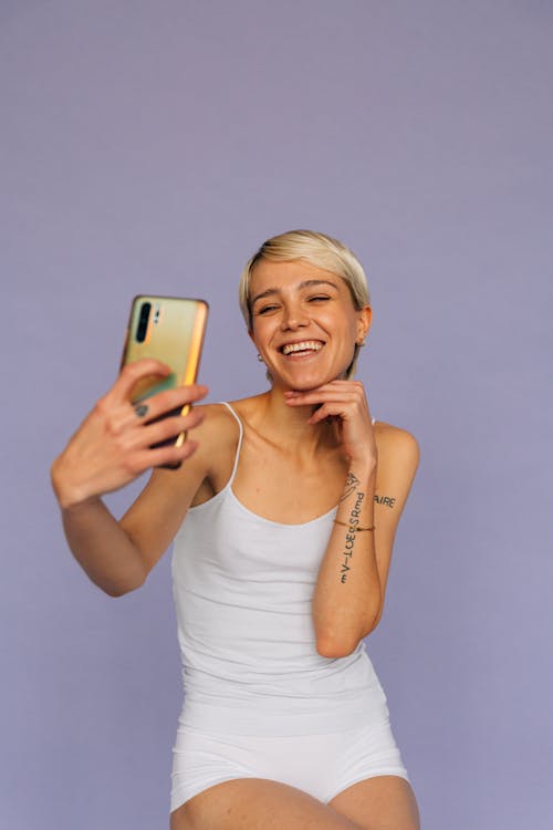 Free Woman with Short Hair Taking Selfie Stock Photo