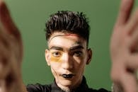 Young Man with Black Lips