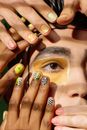 Woman With Brown and Green Manicure