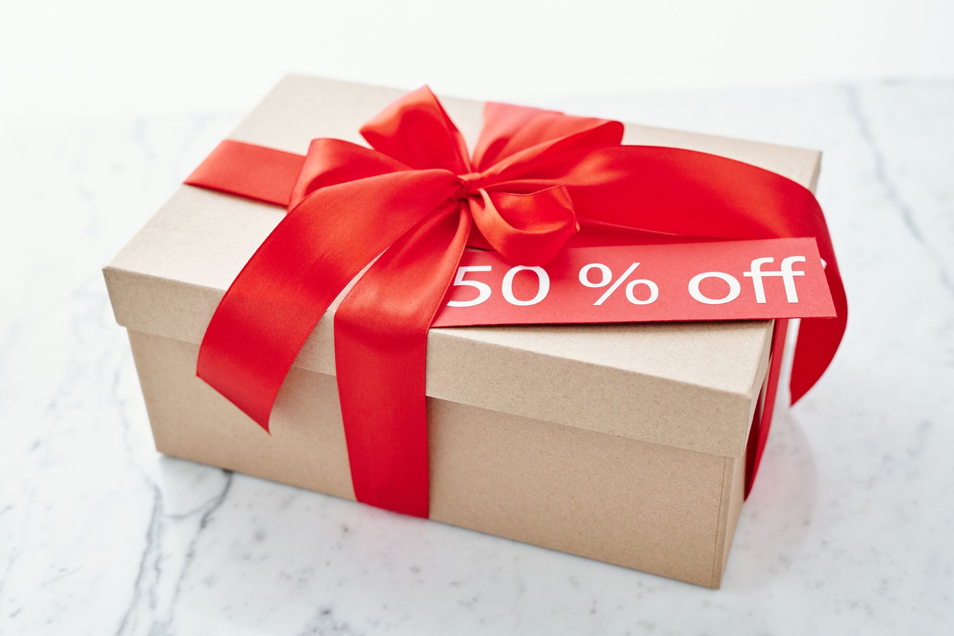 email inbox with a highlighted discount coupon email, smartphone notification, flat illustration
