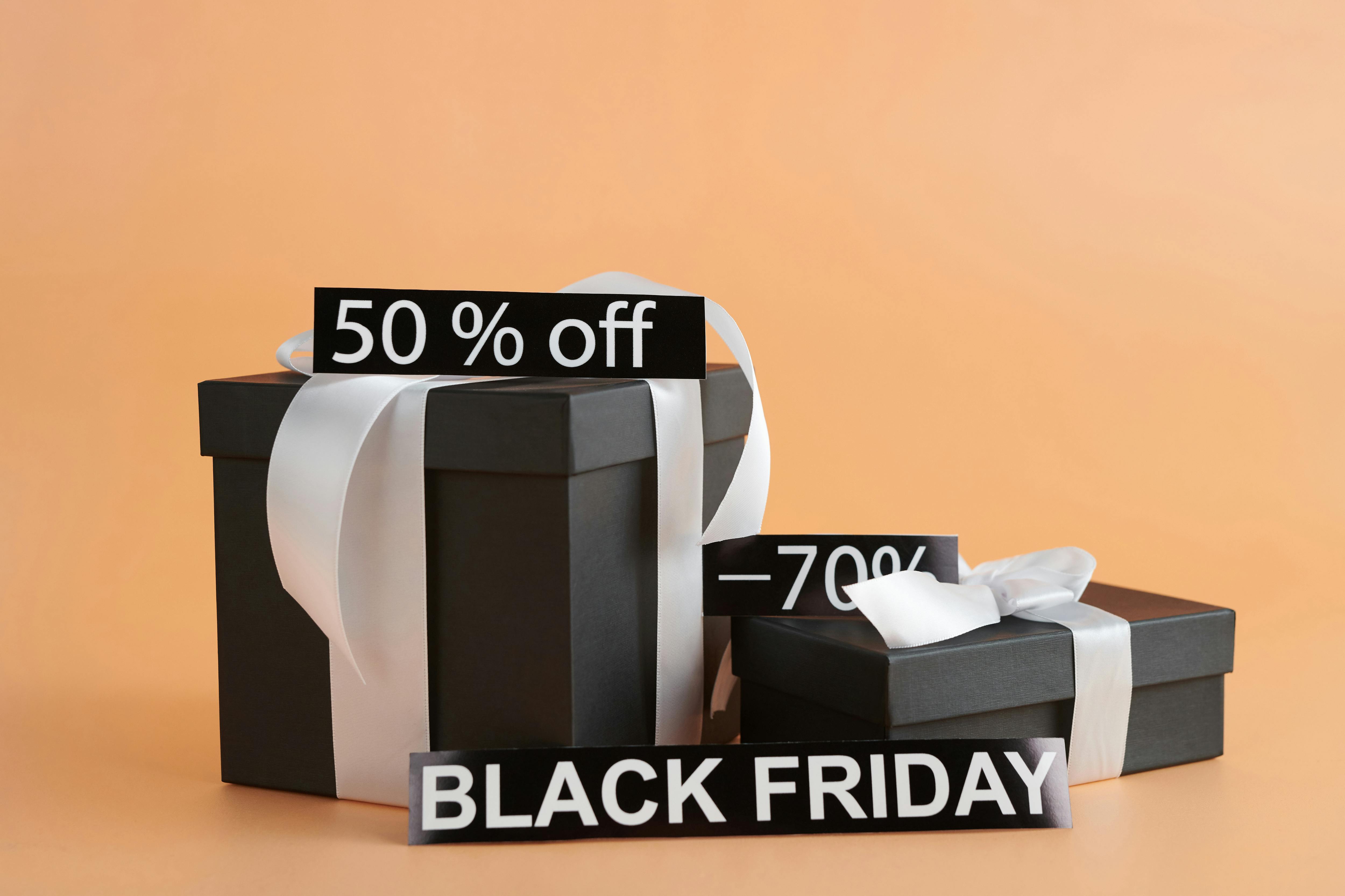 black gift boxes with discount signs