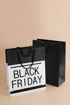 Minimalist shot of Black Friday themed shopping bags showcasing modern consumerism trends.