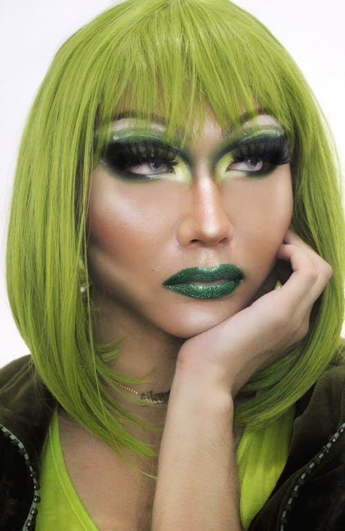Close-Up Shot of a Pretty Woman with Green Hair