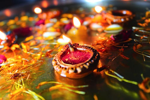 Close-Up Shot of Lighted Candles during Diwali