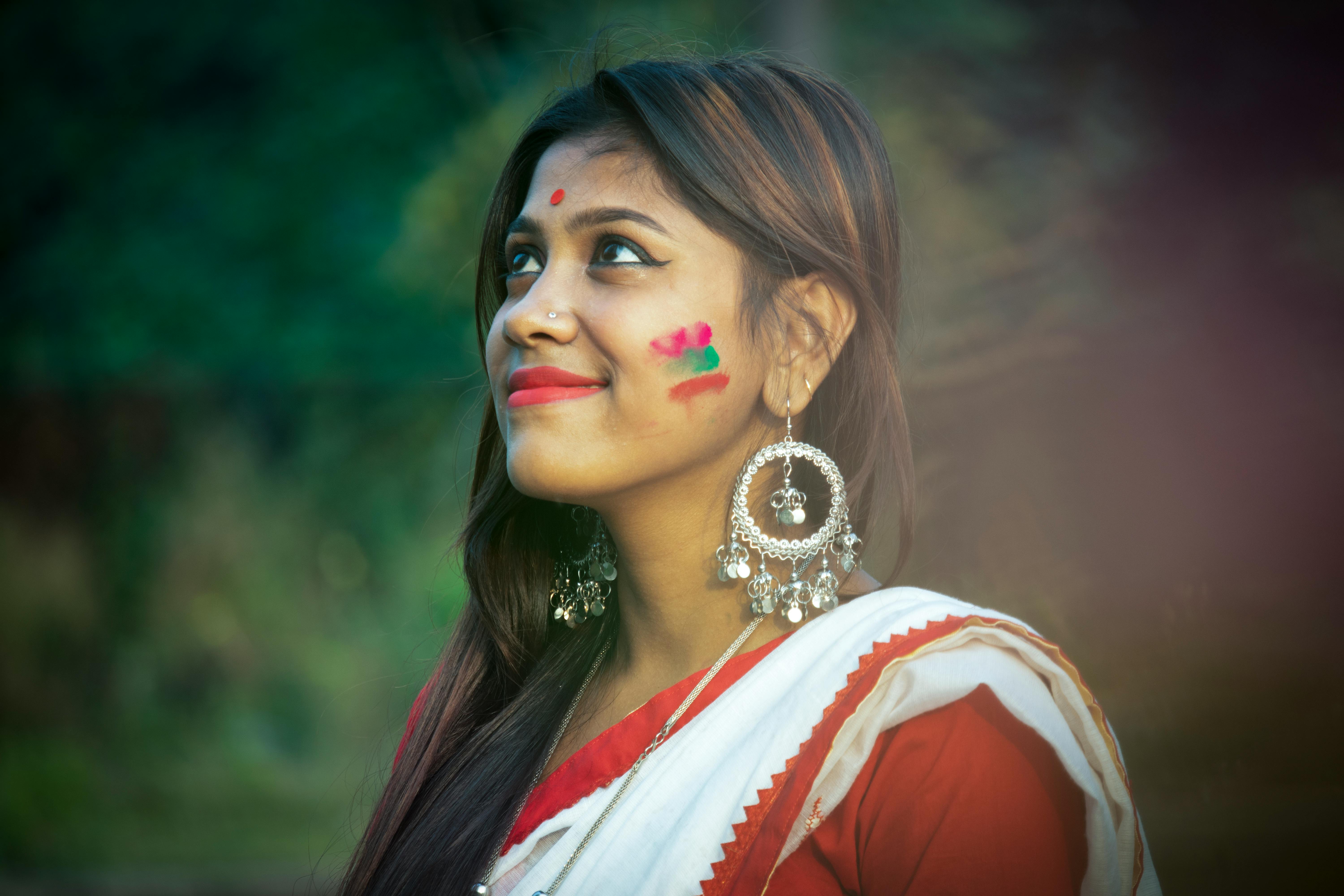 Portrait Of A Beautiful Smiling Indian Woman Wearing Saree And