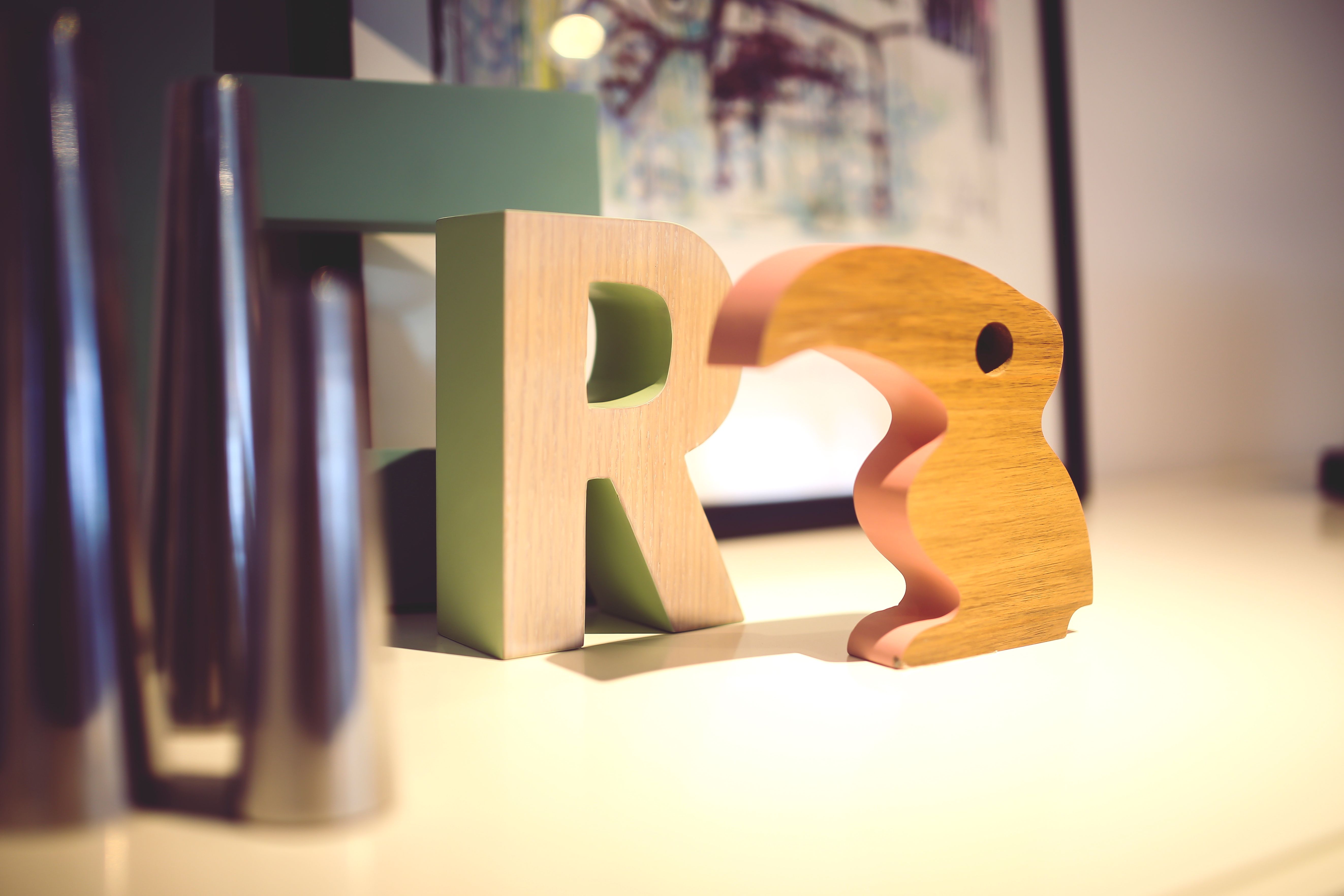 decorative sculptures for the home Creative wooden sculptures in a contemporary interior space, perfect for modern art lovers.