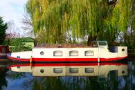 White Red and Blue Boat on Water