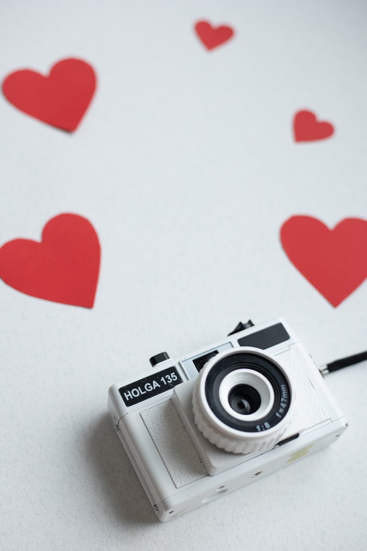 Red Hearts And Retro Photo Camera