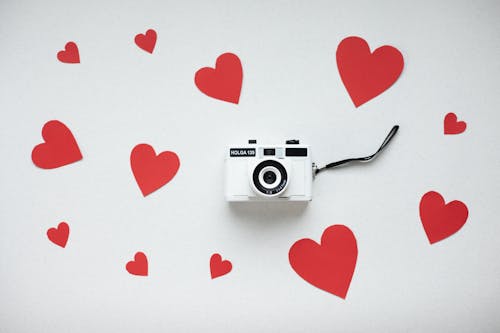 Retro camera with paper hearts