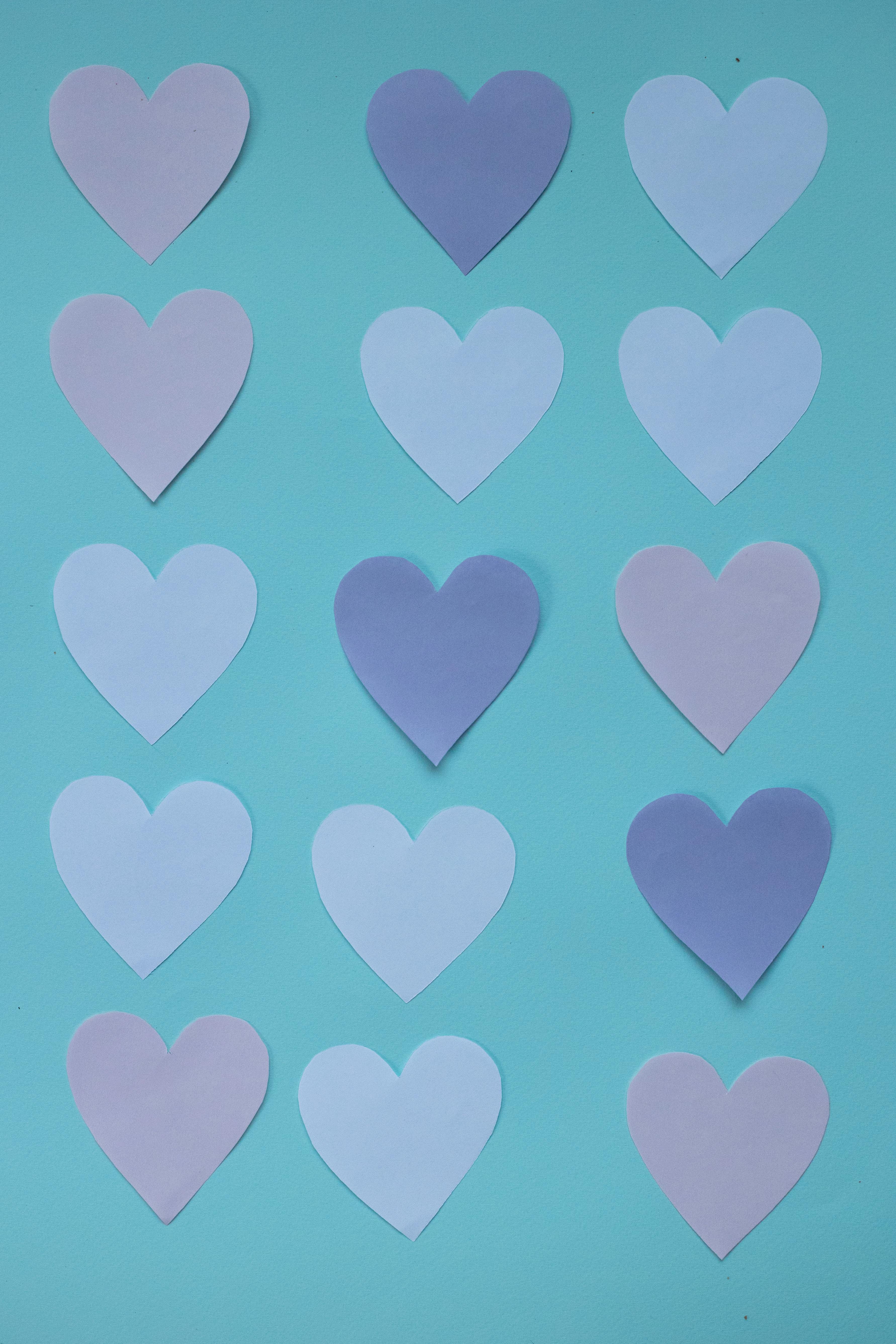 set of paper hearts on table