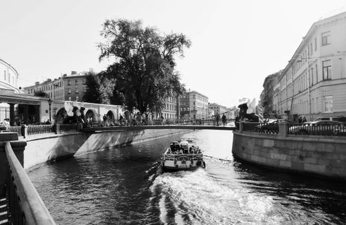 Free Explore the historic canals and architecture of Saint Petersburg, Russia in this grayscale photo. Stock Photo