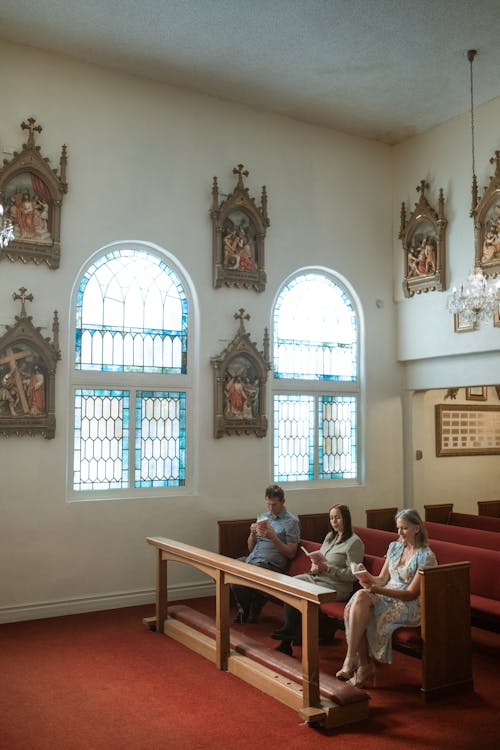 Free People Reading a Bible inside the Church Stock Photo