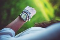 Silver watch on the girl's arm