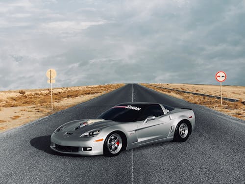 A Silver Sports Car on the Road