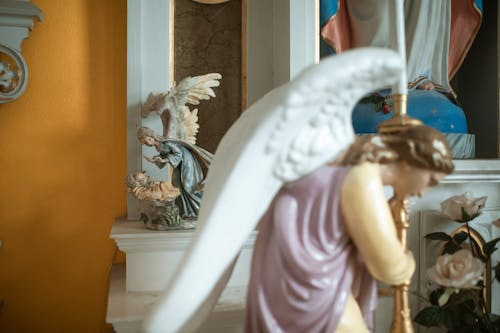 Close-Up Shot of a Religious Figure in the Church