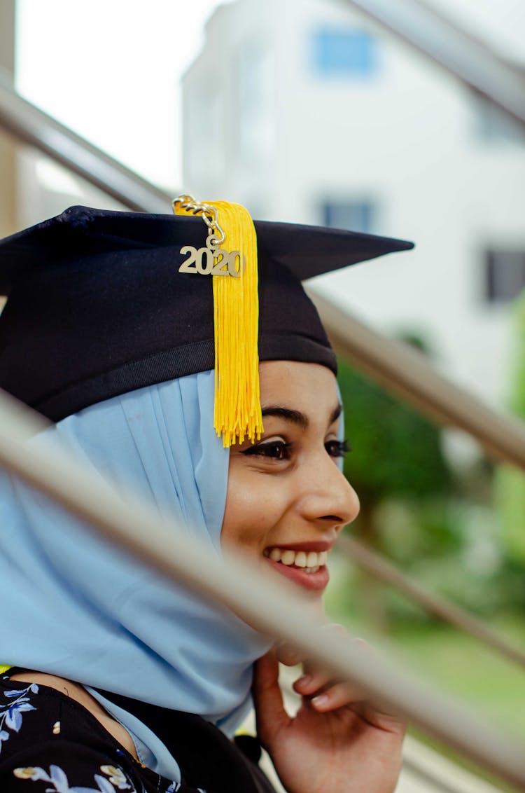 Happy Woman In Graduation Biretta