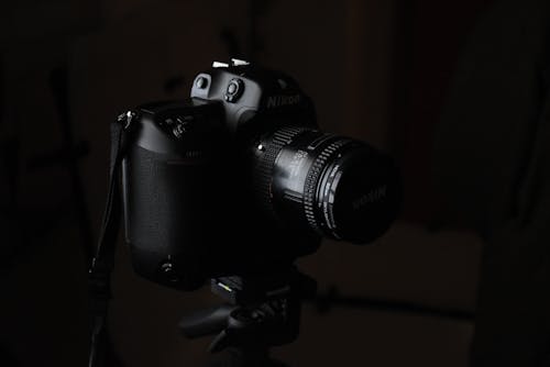Black Nikon Dslr Camera on a Stand